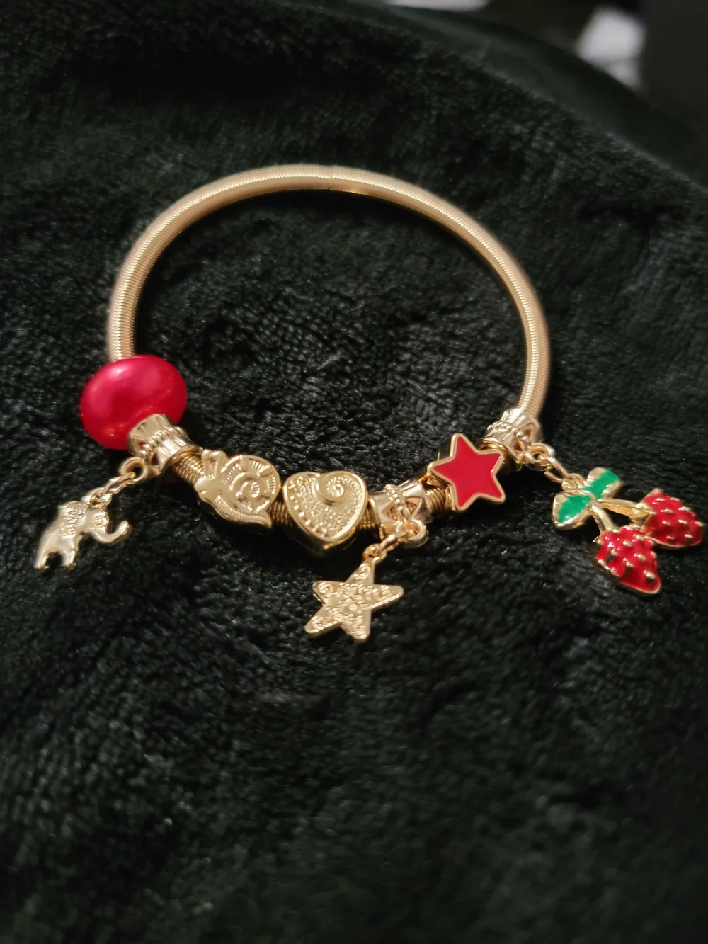 Gold Charm Bracelet with Red and Green Accents